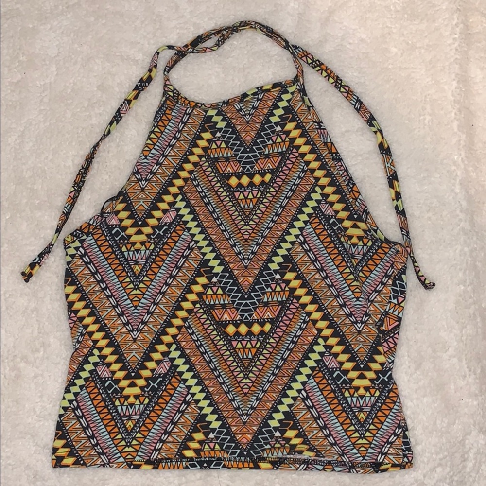 This is a cropped tie back halter top.